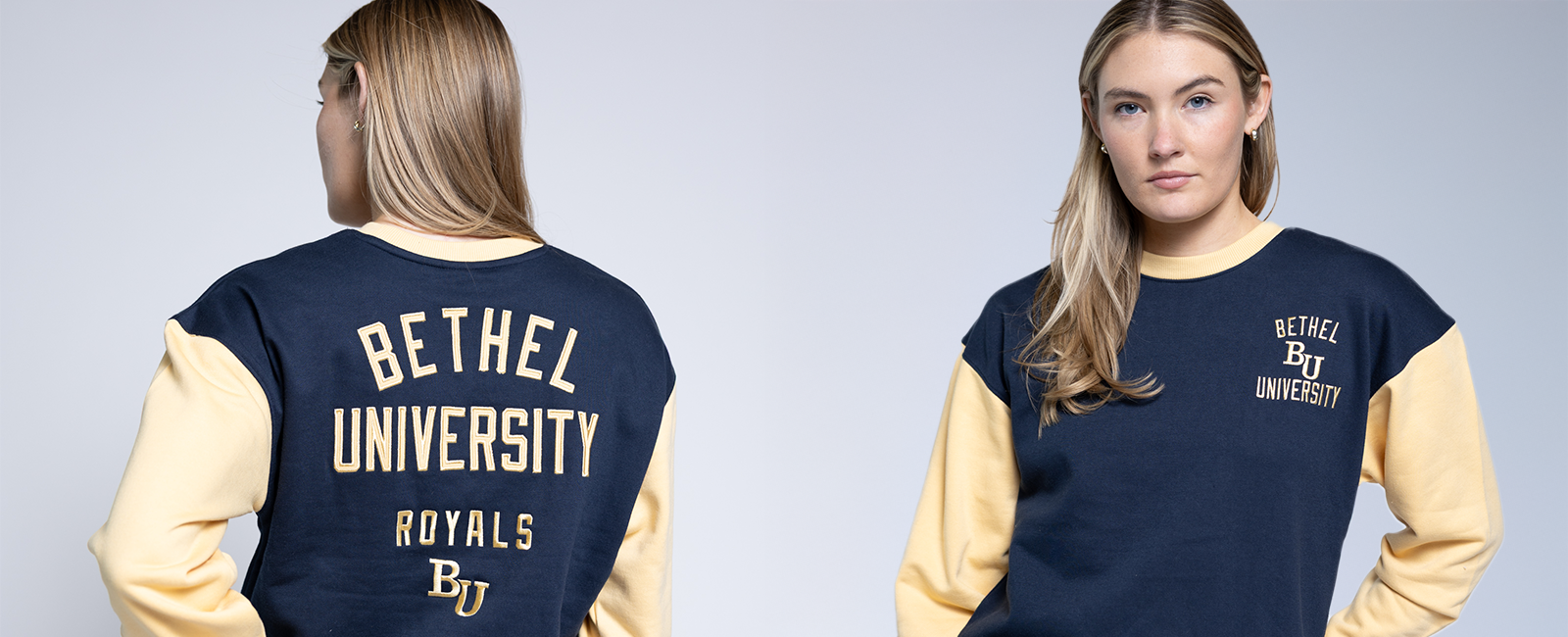Navy blue sweatshirt with 'Bethel University Royals' text on a plain background